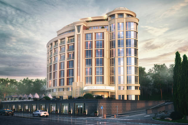 Ten-storey Arden Hotel with illuminated crown in Ukraine