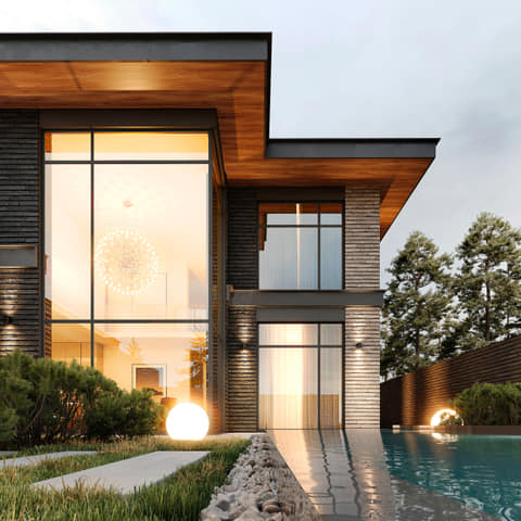Sunlit facade of a contemporary two-storey home in Odesa